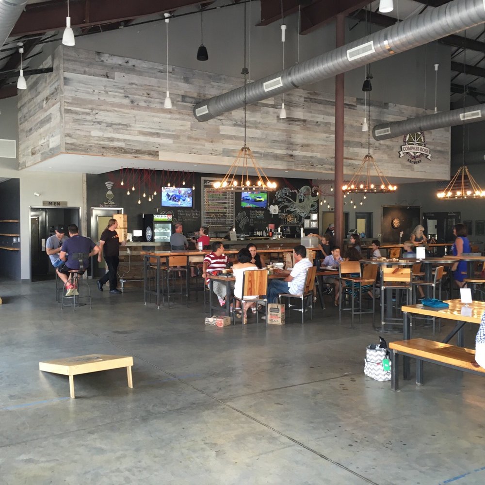 Compass Rose Brewery - Big indoor space. Corn-hole. Huge concrete bar. Kid-friendly. Bring everyone. - Breweries Near Me - Raleigh, North Carolina