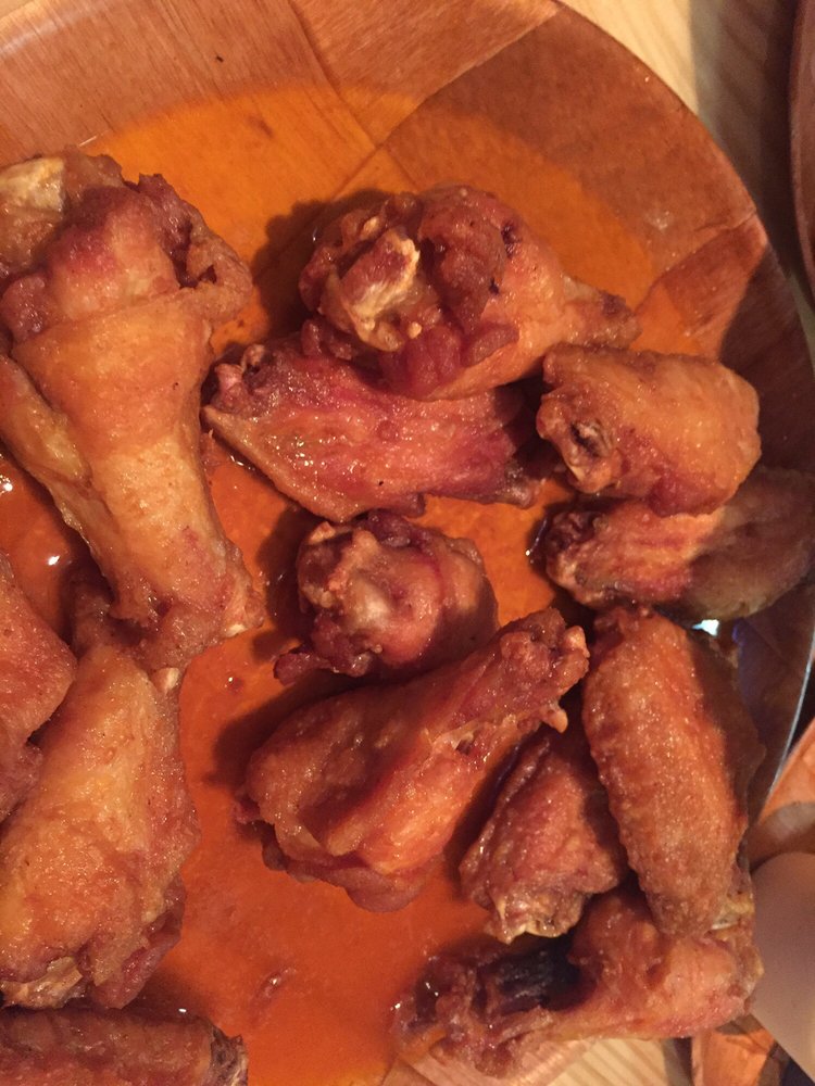 Order World Famous Wings 10 Pieces food online from Rickey's Restaurant & Sports Bar store, Hollywood on bringmethat.com