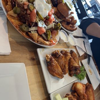 The Chicken Coop Kitchen & Bar - Recommend! Chili nachos, sliders samples with fries, mango habanero and buffalo wings! - Pubs Near Me - Johnston, Rhode Island
