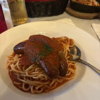 Italia - Spaghetti with Italian sweet sausage and an ice cold Peroni - Italian Near Me - Punta Gorda, Florida