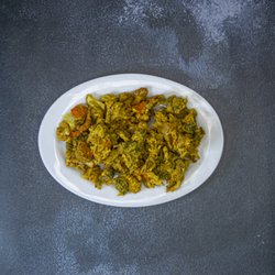 Bollywood Cafe - VEGETABLE PAKORA
Vegetables gently spiced and fried