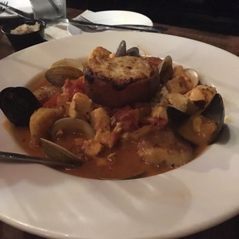 Mama's on the Half Shell - Bouillabaisse- on rice pilaf . Tiny bit too salty but huge and lots of meat - Bars Near Me - Baltimore, Maryland