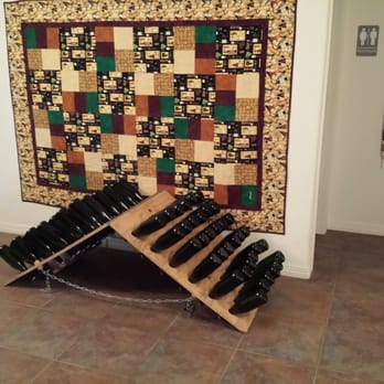 Avant Vineyards - The "pupitre" for sparkling wine - to get rid of sediment. - Wineries Near Me - Palisade, Colorado