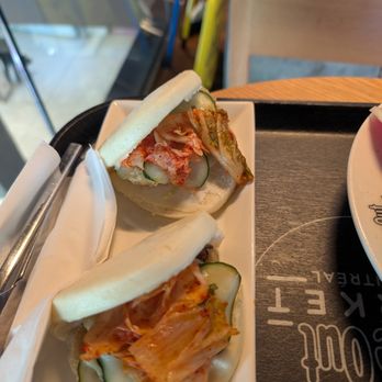 Time Out Market - Tempura Battered Vegetarian Bao Buns with Cucumber and Kimchi. - French Near Me - Montreal, Quebec Time Out Market - Tempura Battered Vegetarian Bao Buns with Cucumber and Kimchi. - French Near Me - Montreal, Quebec