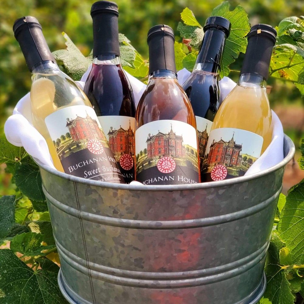 Buchanan House Winery - a bucket full of wine bottles - Wineries Near Me - Tipton, Iowa