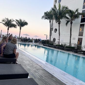 Costa d'Este Beach Resort & Spa - Pool/beach bar area sunset - Hotels Near Me - Vero Beach, Florida