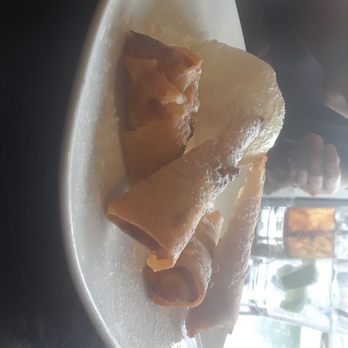 Thai Ghang Waan - Bannana icecream bananna coated in rice soaked coconut that tasted great. - Thai Near Me - Springfield, Virginia Thai Ghang Waan - Bannana icecream bananna coated in rice soaked coconut that tasted great. - Thai Near Me - Springfield, Virginia
