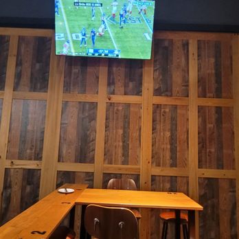 Chapter 11 Brewpub & Smokehouse - a television in a bar - Barbeque Near Me - Brandon, Florida