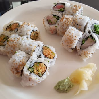 The Old Heights Bistro - Spicy tuna roll on the left, and a Hamachi & Scallion roll on the right - Sushi Bars Near Me - Tampa, Florida The Old Heights Bistro - Spicy tuna roll on the left, and a Hamachi & Scallion roll on the right - Sushi Bars Near Me - Tampa, Florida