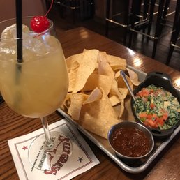 Amaretto Splash and artichoke dip with chips appetizer Amaretto Splash and artichoke dip with chips appetizer