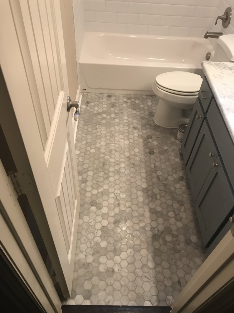 Slide of DNA Roofing & Construction