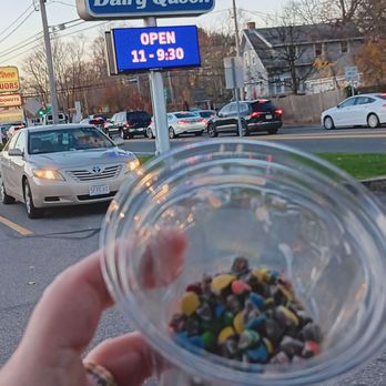 Dairy Queen Store - a hand holding a cup of candy - Fast Food Near Me - Middleboro, Massachusetts
