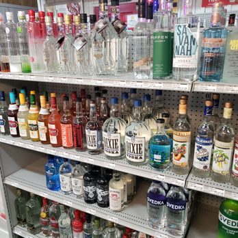 Red Barn Package - a shelf full of liquor bottles - Beer, Wine & Spirits Near Me - Cumming, Georgia