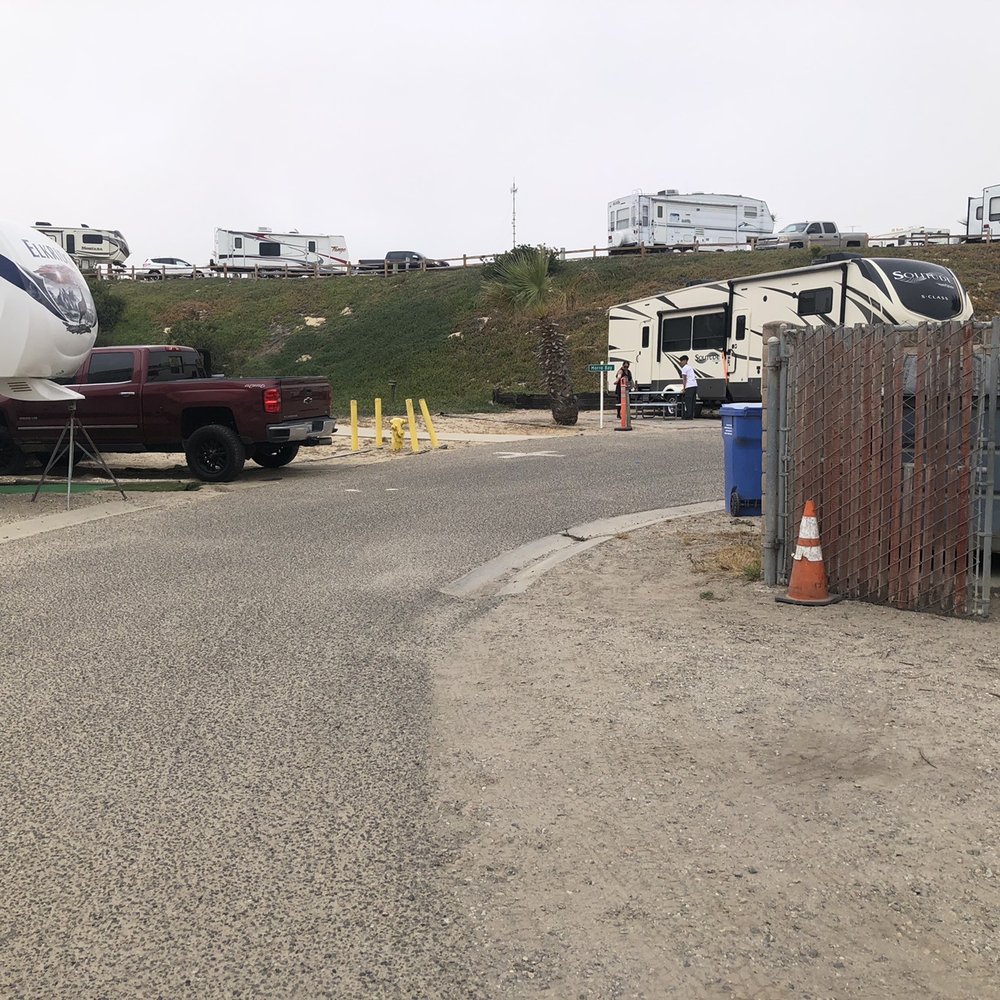 Pacific Dunes Ranch Campground - Another view of turn but with gate closed. My RV is at right. - RV Parks Near Me - Oceano, California Pacific Dunes Ranch Campground - Another view of turn but with gate closed. My RV is at right. - RV Parks Near Me - Oceano, California