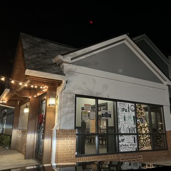 Neoteric Brewing - the outside of the building at night - Burgers Near Me - Huntersville, North Carolina Neoteric Brewing - the outside of the building at night - Burgers Near Me - Huntersville, North Carolina