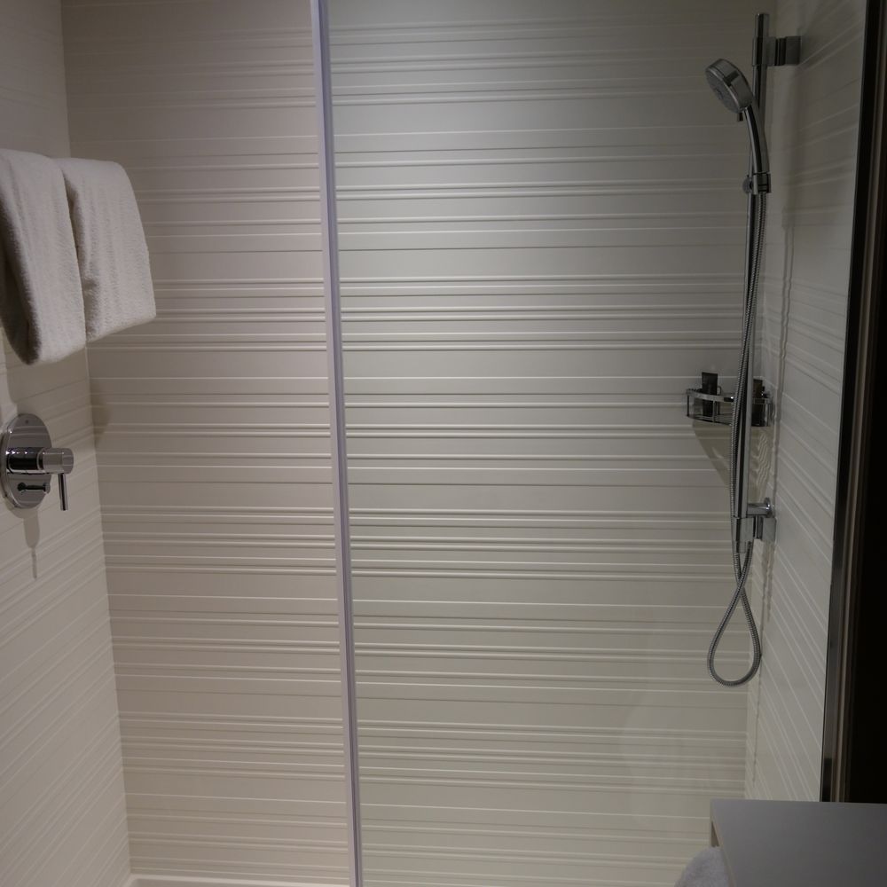 AC Hotel Phoenix Tempe/Downtown - Shower, there's also a rainfall option from the roof if you can figure out the switch. - Hotels Near Me - Tempe, Arizona