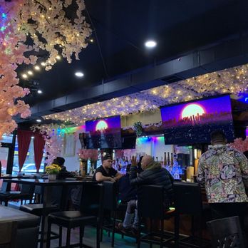 Satori Burgers - people sitting at the bar - Colombian Near Me - East Elmhurst, New York Satori Burgers - people sitting at the bar - Colombian Near Me - East Elmhurst, New York
