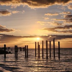 Glunz Ocean Beach Hotel & Resort - A golden sunrise over the ocean.