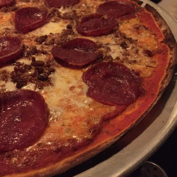 Spunto - Large Slice Pepperoni & Sausage Thin Crust Pizza - Pizza Near Me - New York, New York Spunto - Large Slice Pepperoni & Sausage Thin Crust Pizza - Pizza Near Me - New York, New York