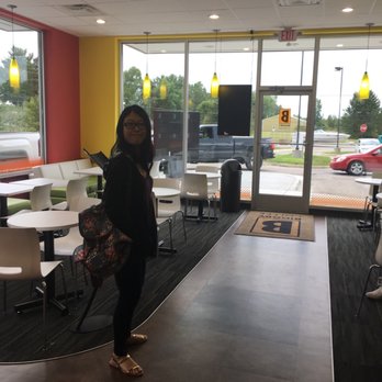 BIGGBY COFFEE - a woman standing in a coffee shop - Coffee & Tea Near Me - Clio, Michigan