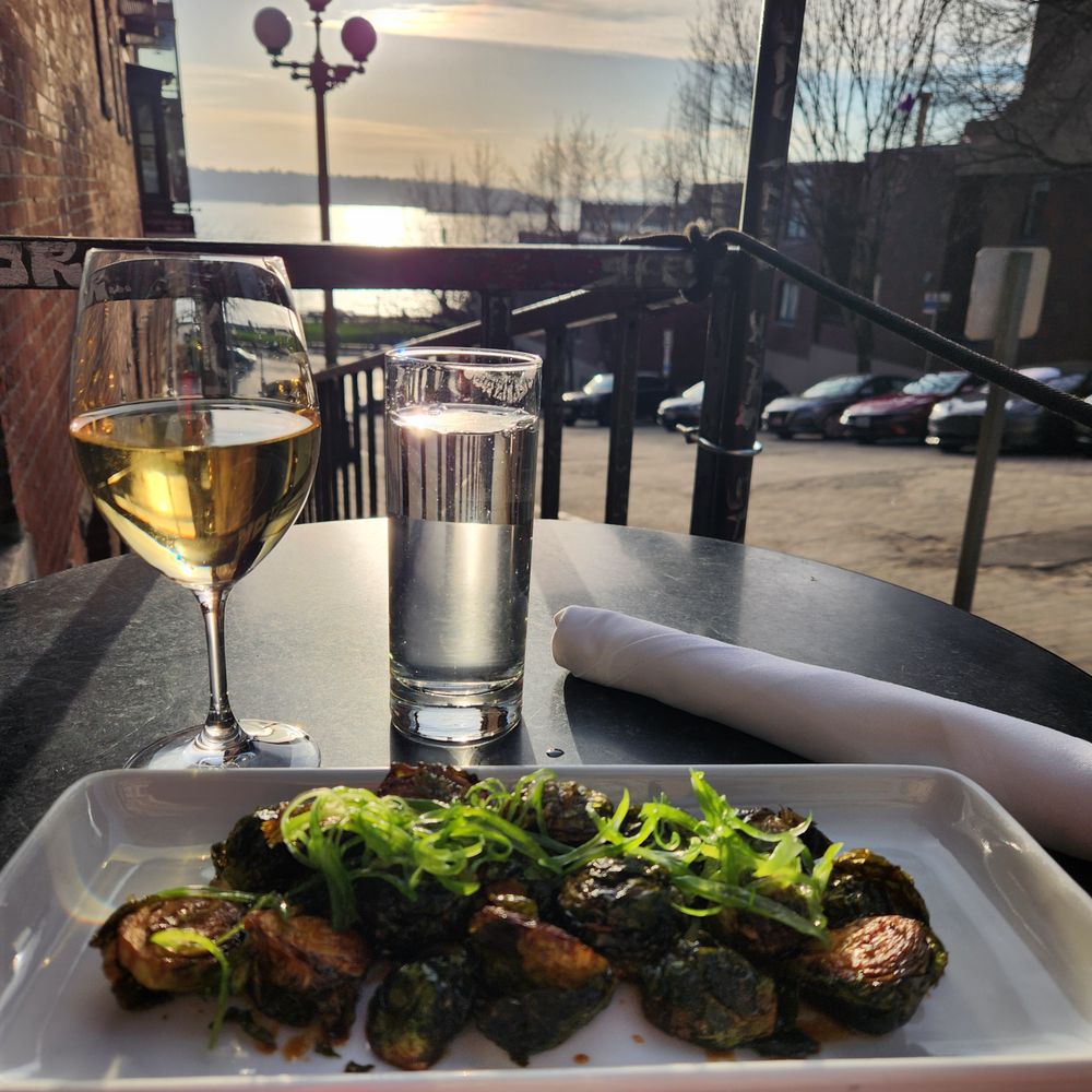 White Burgundy, brussel sprouts, and the best view in Seattle. White Burgundy, brussel sprouts, and the best view in Seattle.