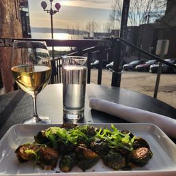 White Burgundy, brussel sprouts, and the best view in Seattle. White Burgundy, brussel sprouts, and the best view in Seattle.