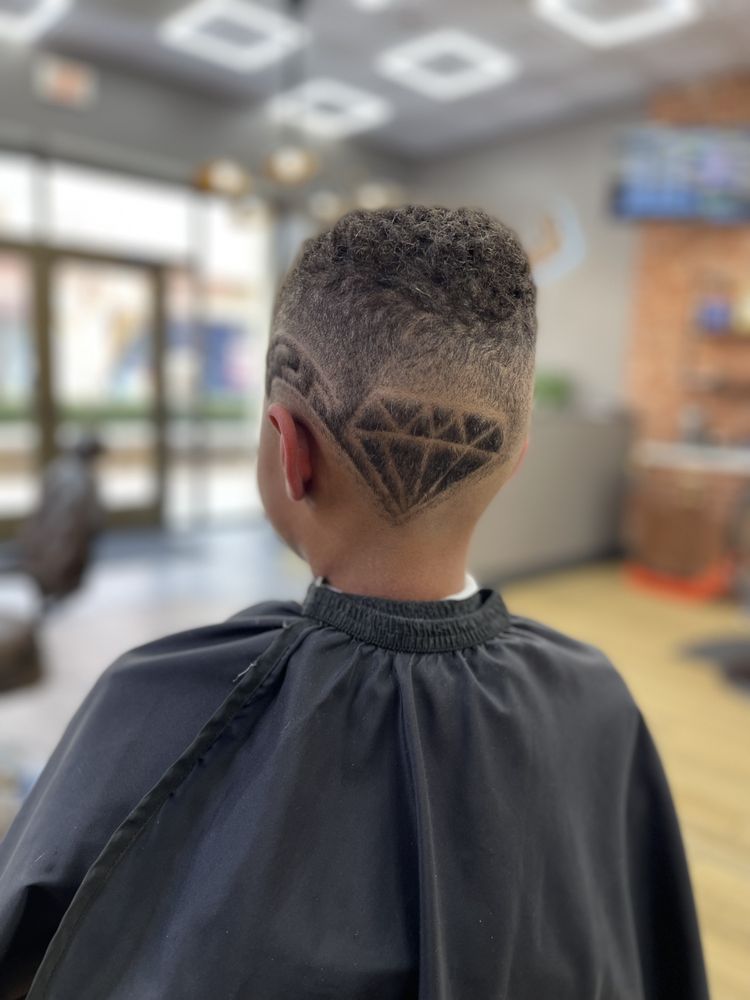 Tainos Barbershop and Lounge Logo