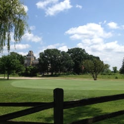 Fort Snelling Golf Course - Hole 7 (green) with Fort Snelling clock tower in the background.