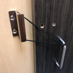 In the ladies fitting room. This is their makeshift solution to locking the door. This one is next to the tri mirrors. In the ladies fitting room. This is their makeshift solution to locking the door. This one is next to the tri mirrors.