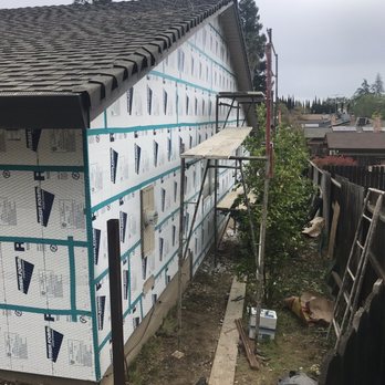 Atlas Stucco - South side of house where we had weather issues, wall system installed on studs after siding was removed. - Stucco Services Near Me