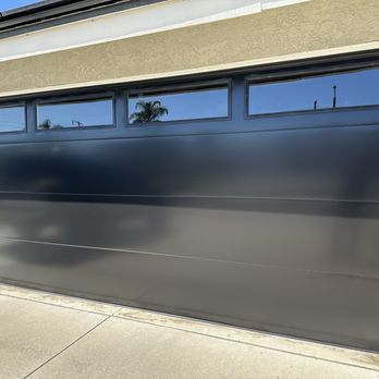 Premier Garage Doors & Gates - Black Smooth modern door - Garage Door Services Near Me - Anaheim, California Premier Garage Doors & Gates - Black Smooth modern door - Garage Door Services Near Me - Anaheim, California
