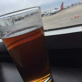 Phipps Bistro - a glass of beer on a window sill - American Near Me - Charlotte, North Carolina Phipps Bistro - a glass of beer on a window sill - American Near Me - Charlotte, North Carolina