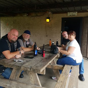 Murphys On 6 - a group of people sitting at a picnic table - Pubs Near Me - Santa Fe, Texas Murphys On 6 - a group of people sitting at a picnic table - Pubs Near Me - Santa Fe, Texas