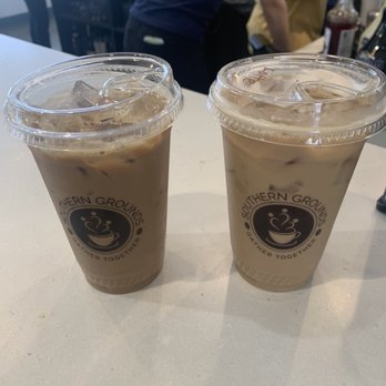Southern Grounds - Left 20oz Iced Dirty Chai with Oat Milk ($6.85); Right 20oz Iced Honey B Lavender Latte with Oat Milk ($6.25) - Cafes Near Me - Jacksonville, Florida Southern Grounds - Left 20oz Iced Dirty Chai with Oat Milk ($6.85); Right 20oz Iced Honey B Lavender Latte with Oat Milk ($6.25) - Cafes Near Me - Jacksonville, Florida