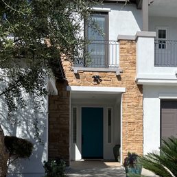Before: dated rust colored manufactured stone