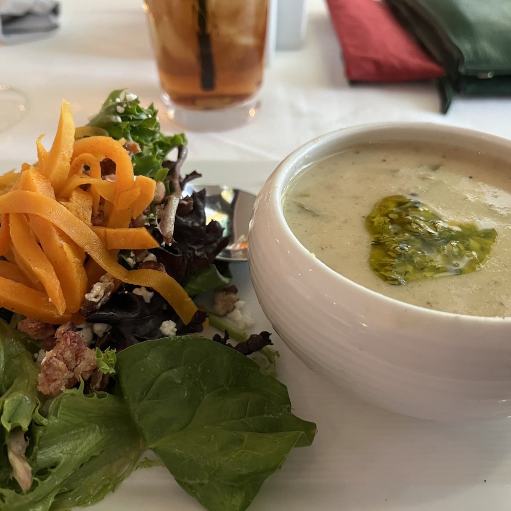 Cream of celery soup and salad Cream of celery soup and salad