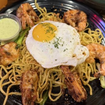 OMELI Kitchen - Cajun Tiger Prawn Garlic Noodles w/ a Sunny Side-up Egg was my dish and I would it order it again - Vietnamese Near Me - Fullerton, California