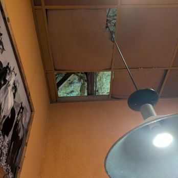 Black Angus Steakhouse - Missing ceiling tile with exposed insulation and cold air drafting down - Steakhouses Near Me - Mesa, Arizona Black Angus Steakhouse - Missing ceiling tile with exposed insulation and cold air drafting down - Steakhouses Near Me - Mesa, Arizona