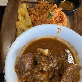 Zola Cultural Kitchen - Goat stew, jollof and plantain - African Near Me - Mesa, Arizona Zola Cultural Kitchen - Goat stew, jollof and plantain - African Near Me - Mesa, Arizona