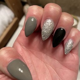 Left hand, very short index nail and different length nails in comparison to right hand