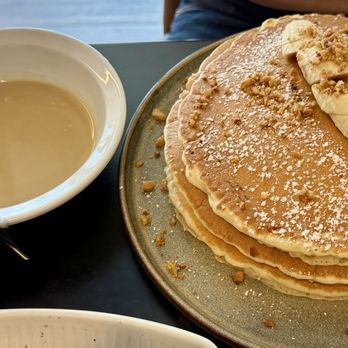 Pasifika Grill & Bar - Macadamia Nut Pancakes, with pani popo sauce on the side. - Guamanian Near Me - Bellevue, Washington