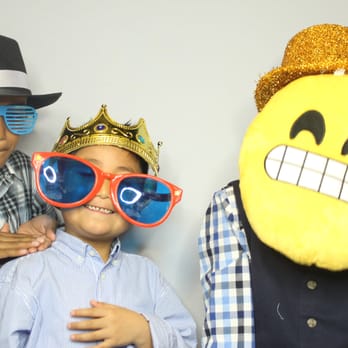 Sybex Booths - Kids enjoying the photo booth at their grandfathers birthday bash - Photo Booth Rentals Near Me - Napa, California