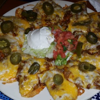 Chili's - New batch of nachos. I didn't expect them to be individual pieces, but this was much better than the first batch. Still salty. - American Near Me - Hoffman Estates, Illinois