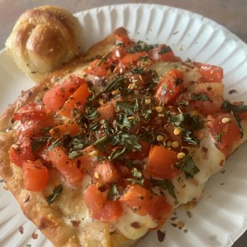 Mario's Pizza Shops - a slice of pizza on a paper plate - Pizza Near Me - Northampton, Pennsylvania