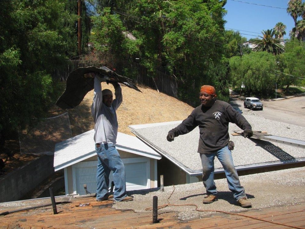 Slide of Roofing Contractors Inc