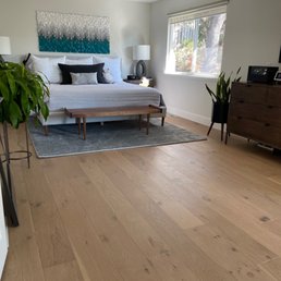 a bedroom with a large bed a bedroom with a large bed