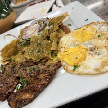 El Sazon De Alferez - Green chilaquiles,steak asado with well cooked eggs. - Mexican Near Me - Los Angeles, California El Sazon De Alferez - Green chilaquiles,steak asado with well cooked eggs. - Mexican Near Me - Los Angeles, California
