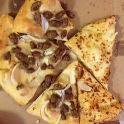 Domino's Pizza - Ordered half cheese, half beef and onions.. Literally no sauce on any of it, and no cheese on the beef and onions half...