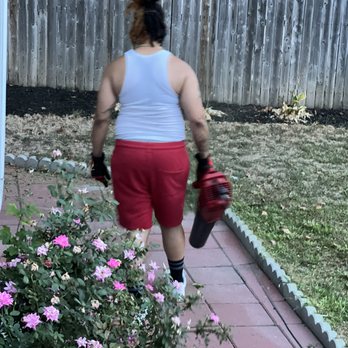 Perez Lawn Maintenance - a woman in red shorts and a white tank top - Lawn Services Near Me Perez Lawn Maintenance - a woman in red shorts and a white tank top - Lawn Services Near Me