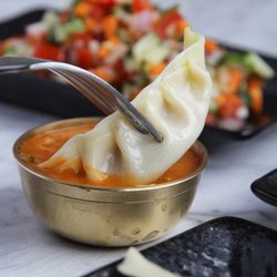 Nepal Dining Room - Chicken Momo. Image source: Nepal Dining Room
